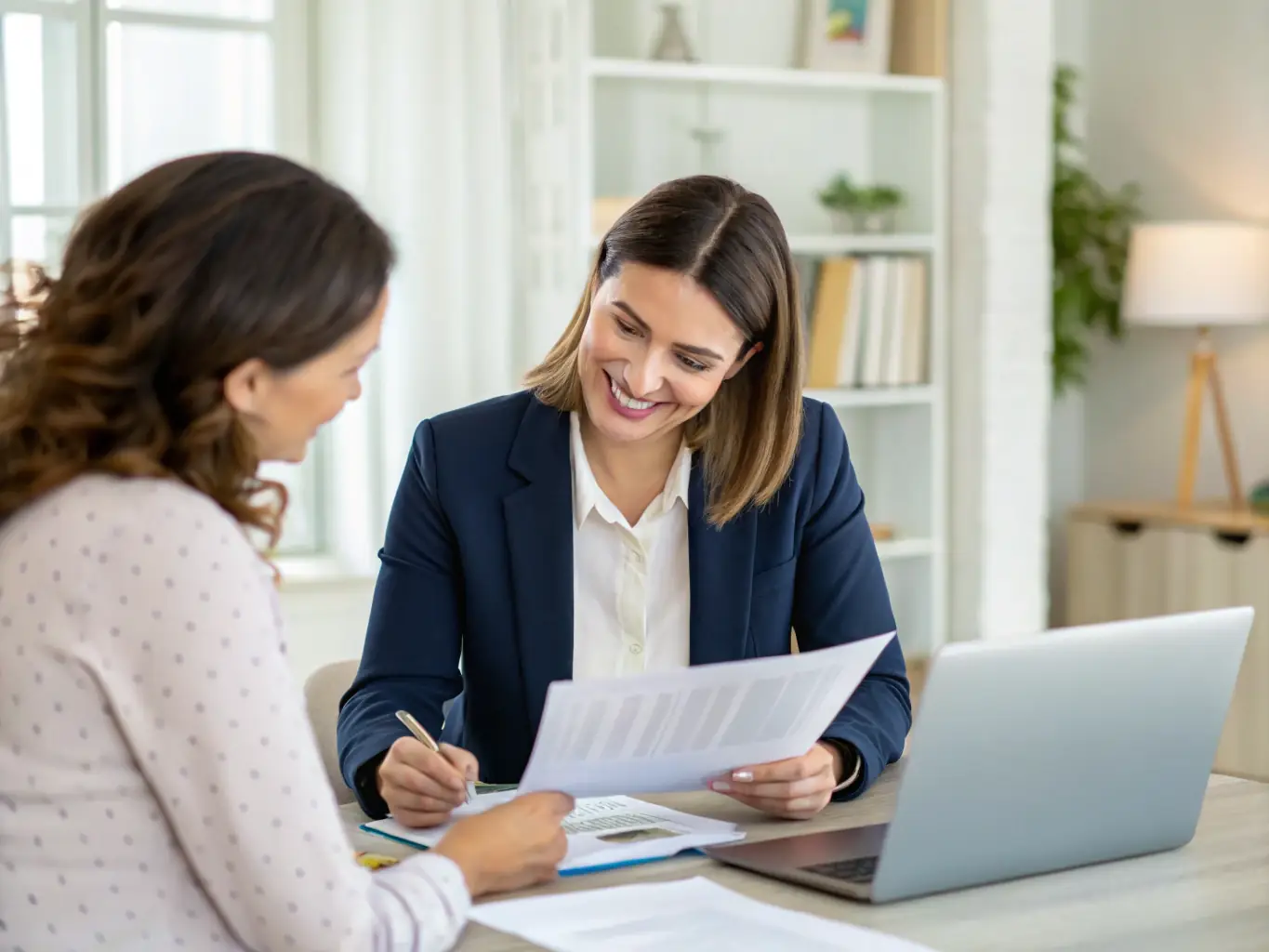 A professional meeting between a financial advisor and a client reviewing wealth management documents in a modern office, illustrating binbox.fun's Wealth Management service.